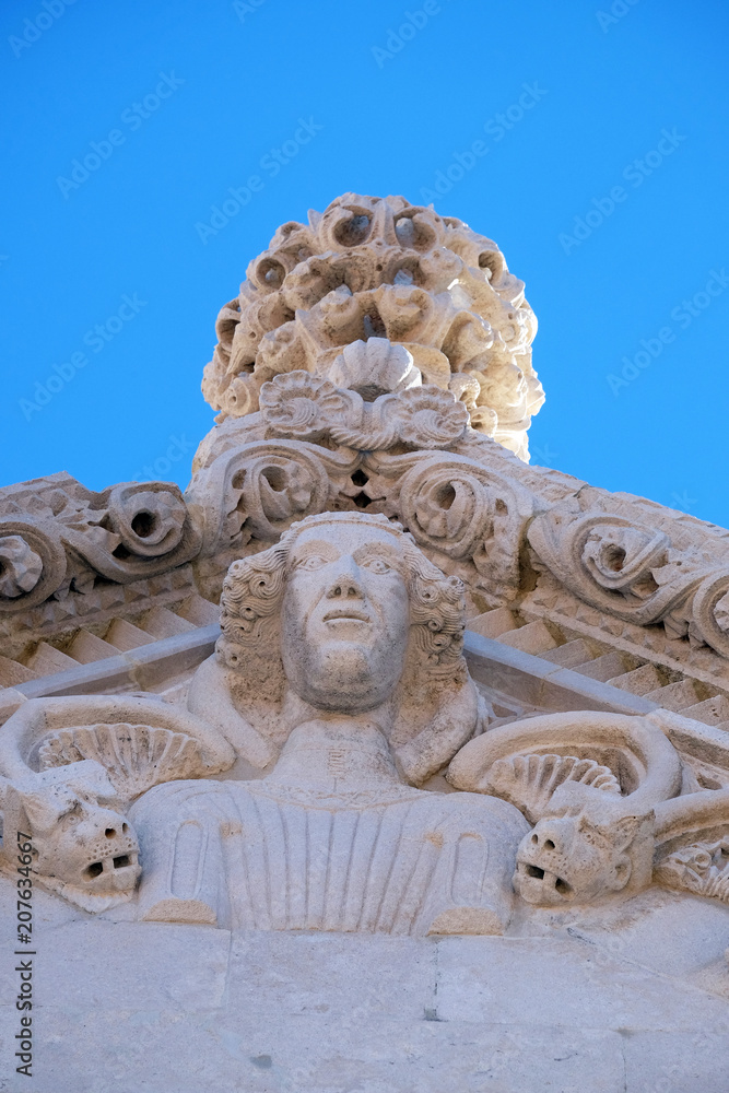 The sculpture, decoration on the St Mark s Cathedral in the historic city Korcula at the island Korcula in Croatia.