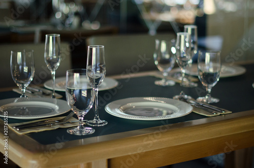 Empty glasses in restaurant, table setting © manitu_gluk