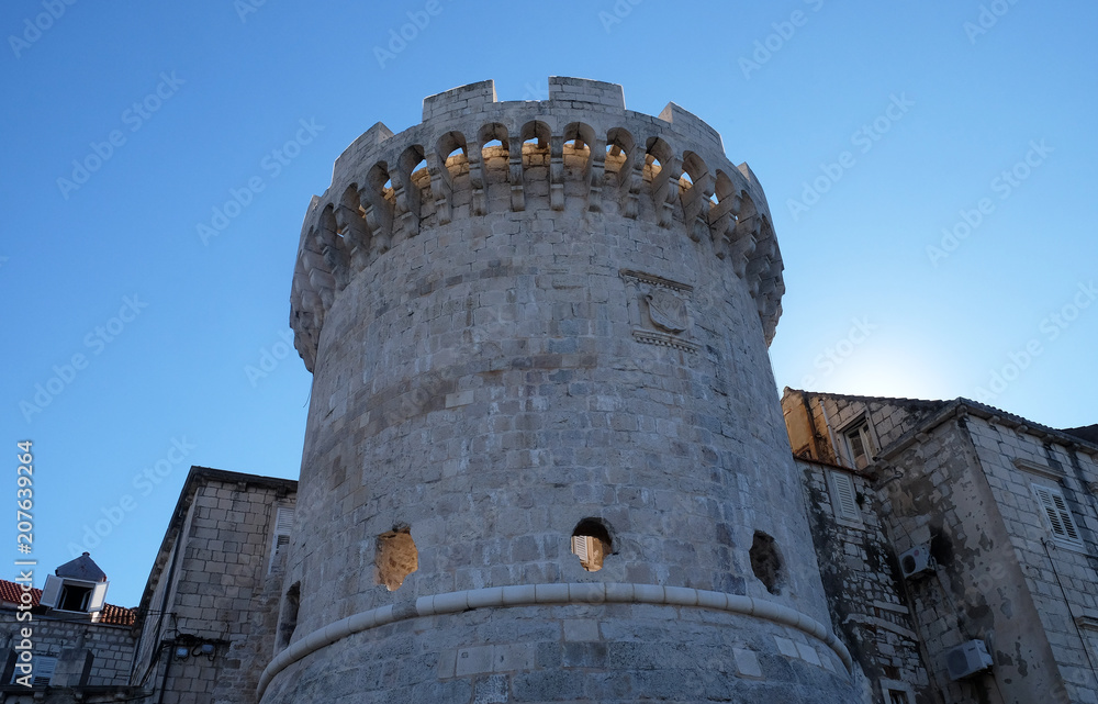 One of the towers in the ancient city wall of the historic city Korcula at the island Korcula in Croatia One of the towers in the ancient city wall of the historic city Korcula at the island Korcula in Croatia