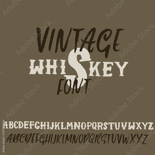 Grunge vintage whiskey font. Old handcrafted display skript. Modern brush label lettering. Vector typography illustration.