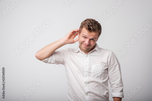 Caucasian man having doubts.