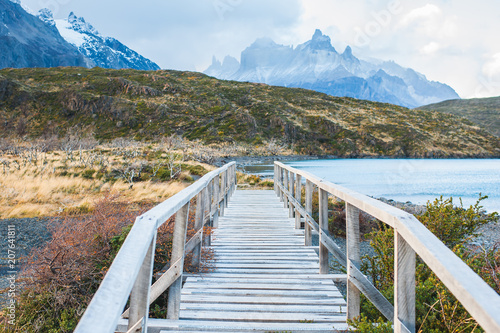 Fototapeta Naklejka Na Ścianę i Meble -  Wooden walkway in Torres Del Paine National Park in Patagonia
