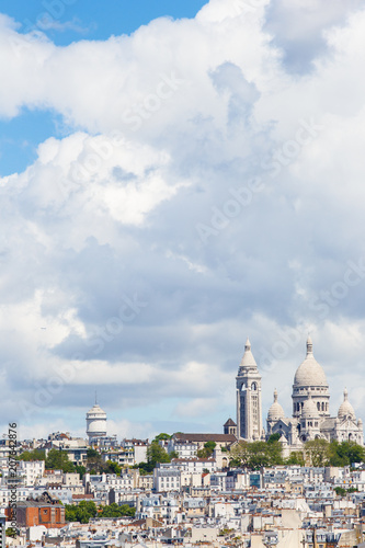 Basilica of Sacred Heart Sacre-Cur on background of skyscape with cloudes