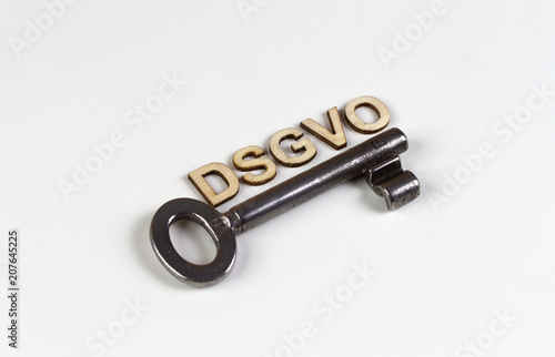 DSGVO word in wooden letters with old key photo