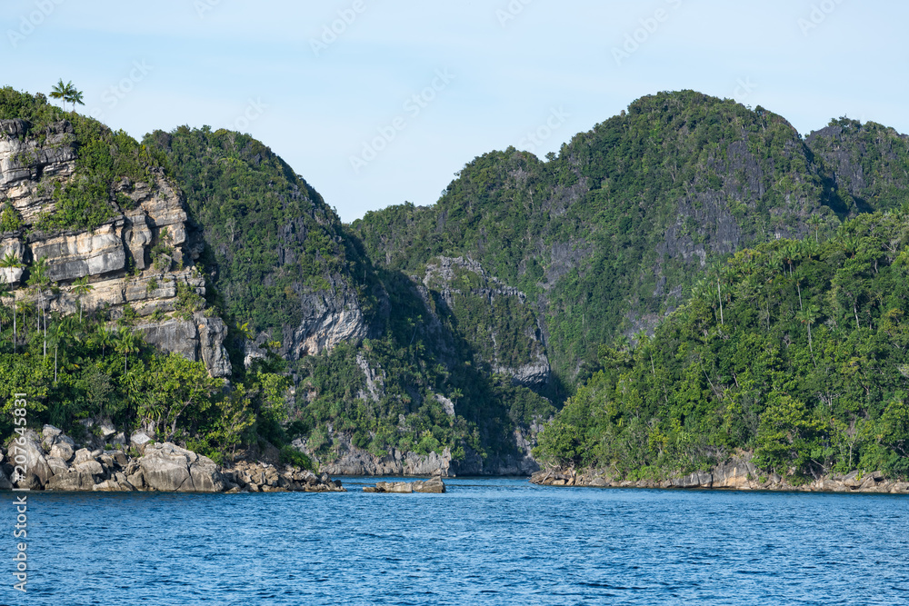 East Misool, group of small island in shallow blue lagoon water, Raja Ampat, West Papua, Indonesia East Misool, group of small island in shallow blue lagoon water, Raja Ampat, West Papua, Indonesia