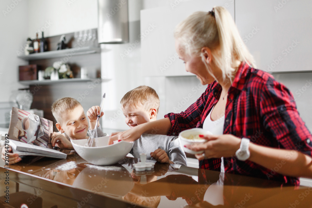mom and children preparing breakfast mom and children preparing breakfast