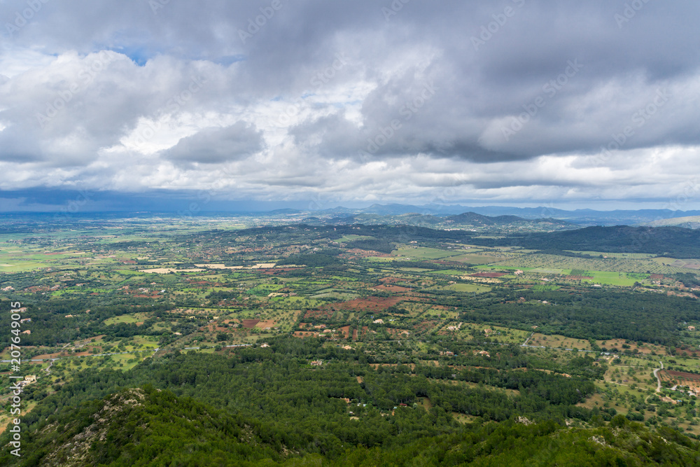 Fototapeta premium Mallorca, Mountainous, green forest covered nature landscape and fields from above