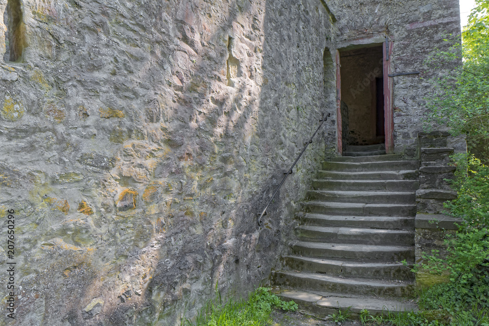 Braunfels, Germany - Old, damaged, stone stairs by the castle. Braunfels, Germany - Old, damaged, stone stairs by the castle.