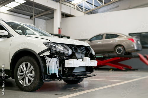 car repair station with soft-focus and over light in the background © memorystockphoto