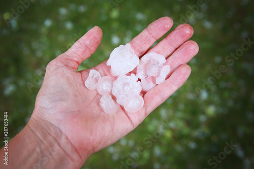 Hail in hands after hailstorm