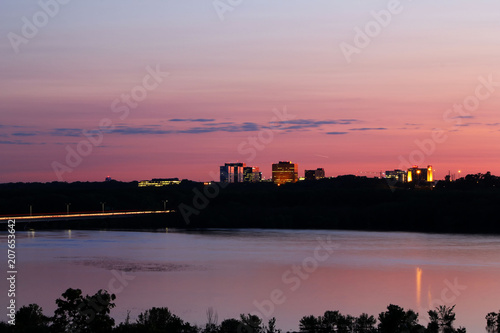 Sunset over Bloomington, Minnesota with the Mississippi River in foreground. photo