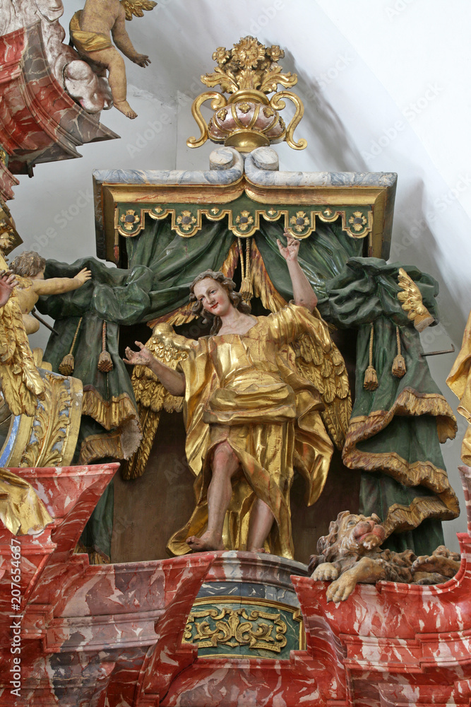 Angel, statue on altar in cathedral of Assumption in Varazdin, Croatia