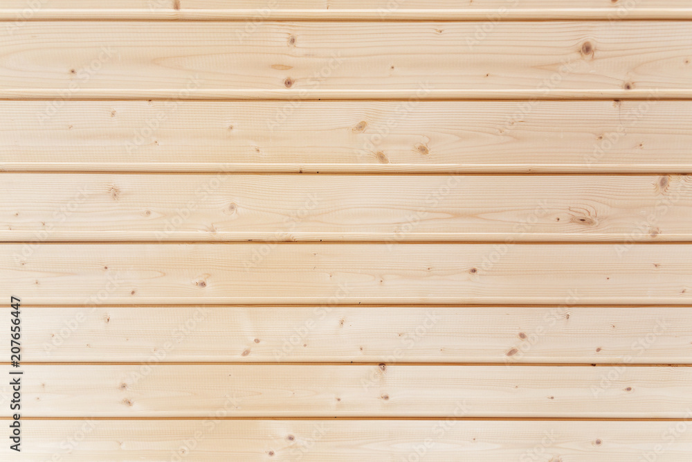 Naklejka premium Wooden background of unpainted strips. Horizontal stripes.