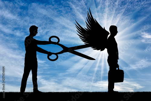 Valokuvatapetti A man with big scissors in his hands intends to cut off the wings of the man in