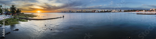Montevideo, the Uruguay capital, has an amazing coastal path to enjoy during the sunset with great views over the old city photo