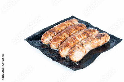 The grill sausages in plastic pack.