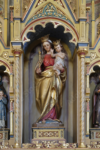 Virgin Mary with baby Jesus statue on altar of Our Lady in the church of Saint Matthew in Stitar, Croatia 