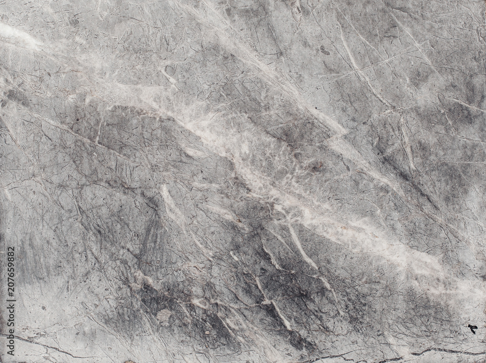 Naklejka premium Fragment of stone texture with scratches and cracks. Natural Background.