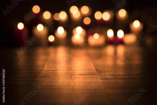 Lit candles burning in the Church