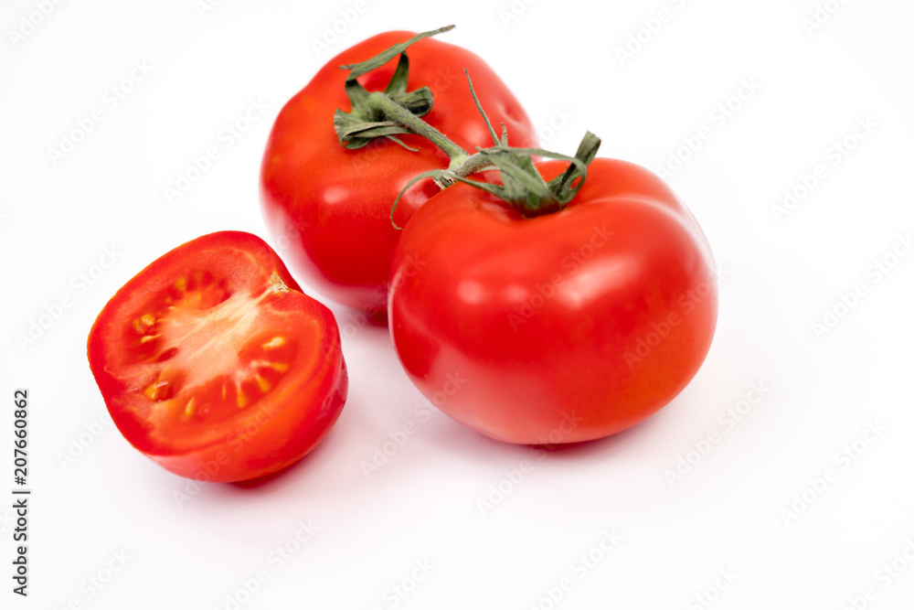 Red tomato isolated on white background with clipping path Red tomato isolated on white background with clipping path