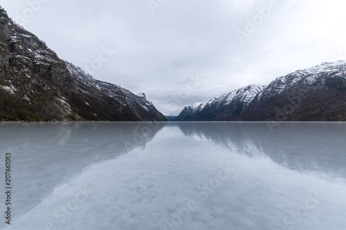 Hardanger fjord frozen winter with sheds Norway photo
