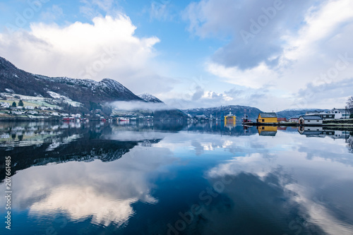 Olen reflection oil rigs lake mirror like