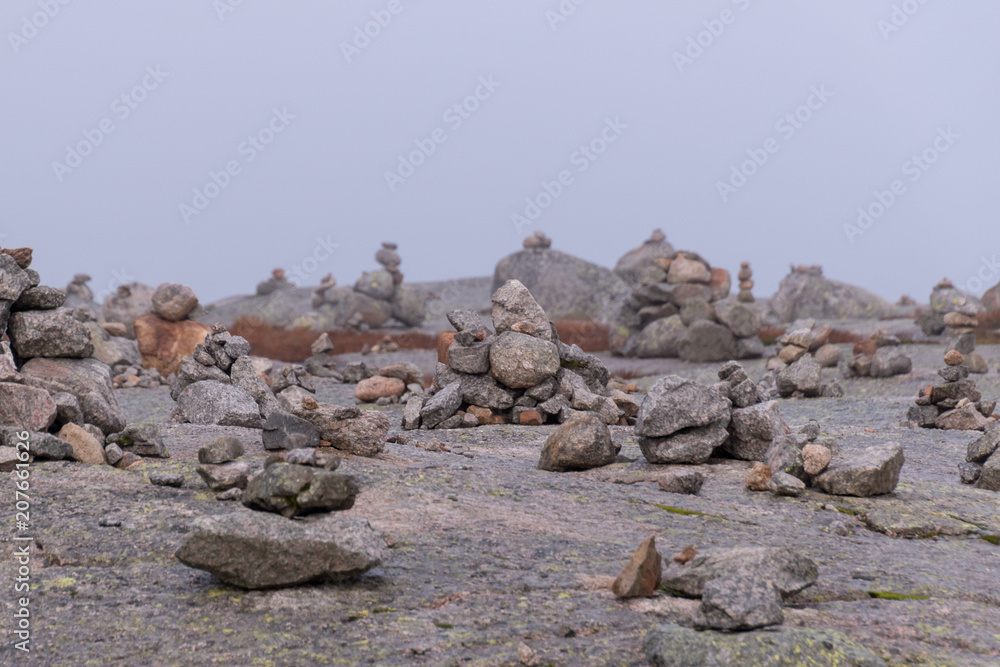 Stacked stones hiking tradition grey landscape