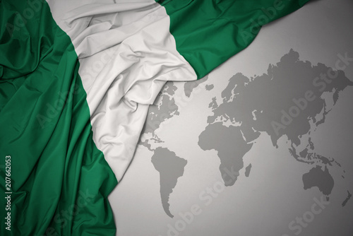 waving colorful national flag of nigeria. photo