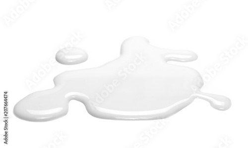Spilled milk puddle isolated on white background and texture