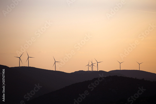Windmills during sundown in Primorski dolac, Croatia