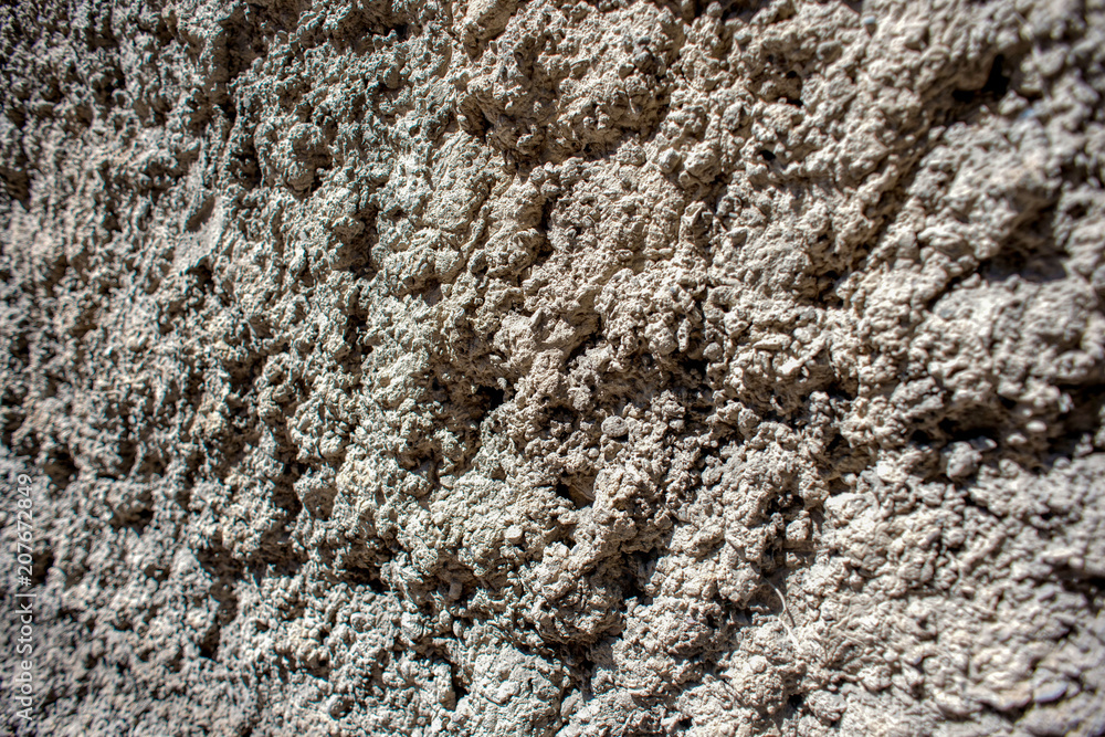 A close-up photography of the old home wall plaster. A close-up photography of the old home wall plaster.