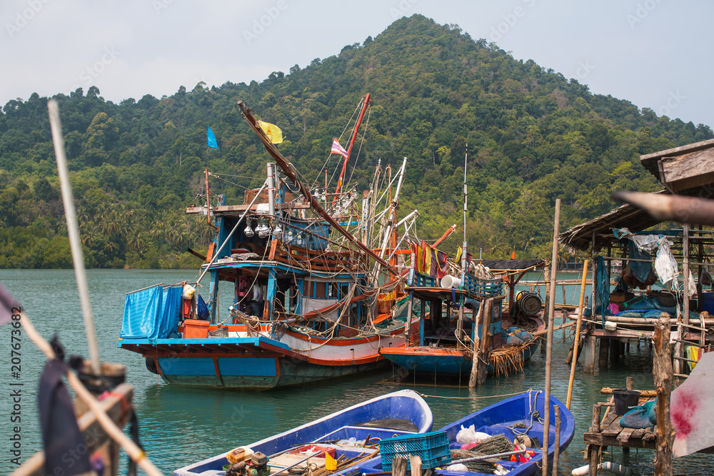 Fototapeta premium Thai boats for night fishing squid in the fishing village.