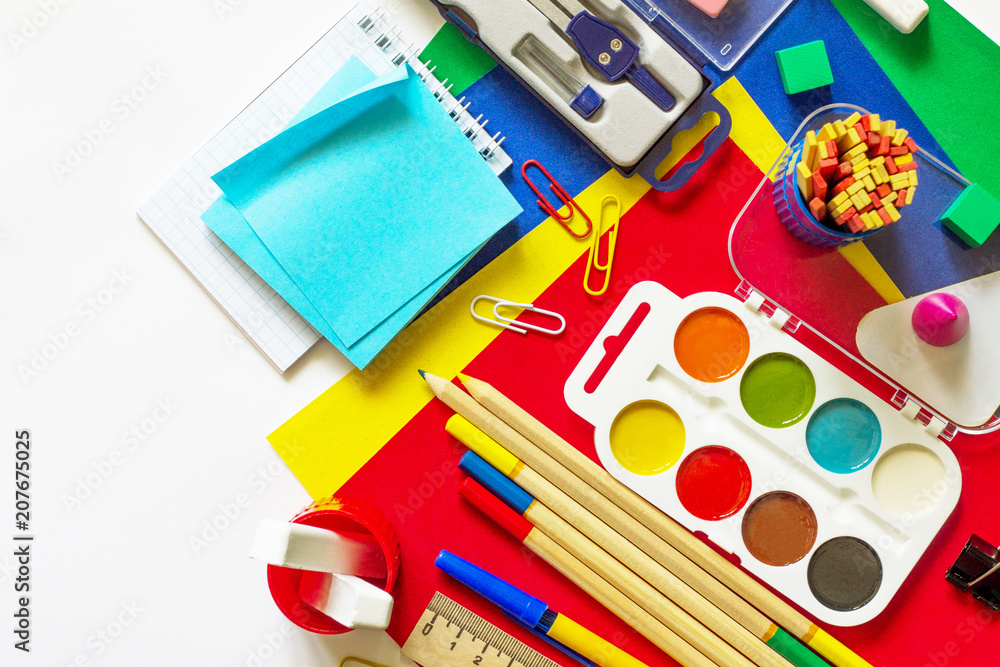 Office supplies and stationery isolate on a white background. Top view flat lay background, copy space. Office supplies and stationery isolate on a white background. Top view flat lay background, copy space.