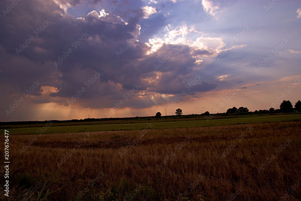 Fototapeta premium heavy a storm cloud in the Countryside