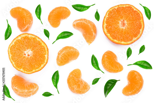 slices of tangerine with leaves isolated on white background. Flat lay, top view.