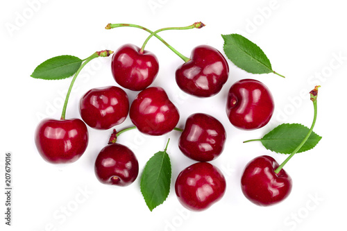 Sweet red cherries with leaves isolated on white background. Top view. Flat lay pattern