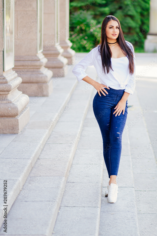 street fashion beautiful young woman with gorgeous hair , urban style of life , happy beautiful summer girl in the street , a black choker on his neck street fashion beautiful young woman with gorgeous hair , urban style of life , happy beautiful summer girl in the street , a black choker on his neck