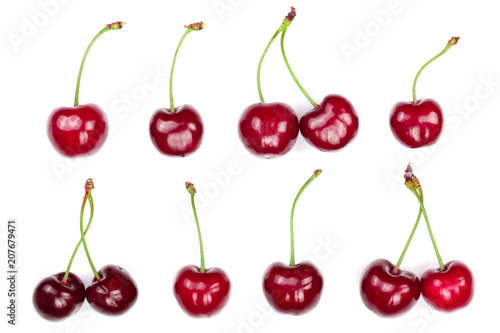 Sweet red cherries isolated on white background. Top view. Flat lay pattern