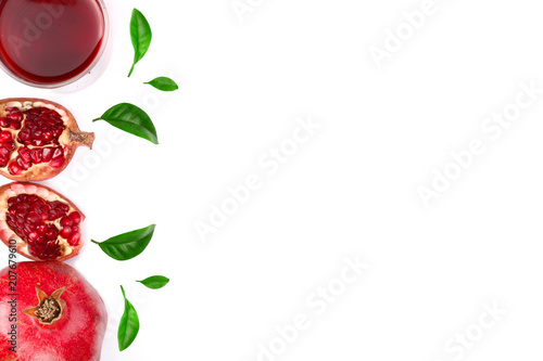 pomegranate juice with fresh pomegranate fruits isolated on white background with copy space for your text. Top view