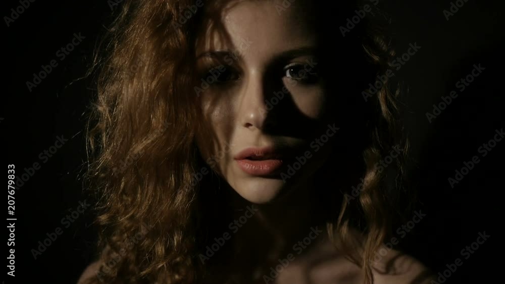 Curly haired girl is trying to seduce somebody Curly haired girl is trying to seduce somebody