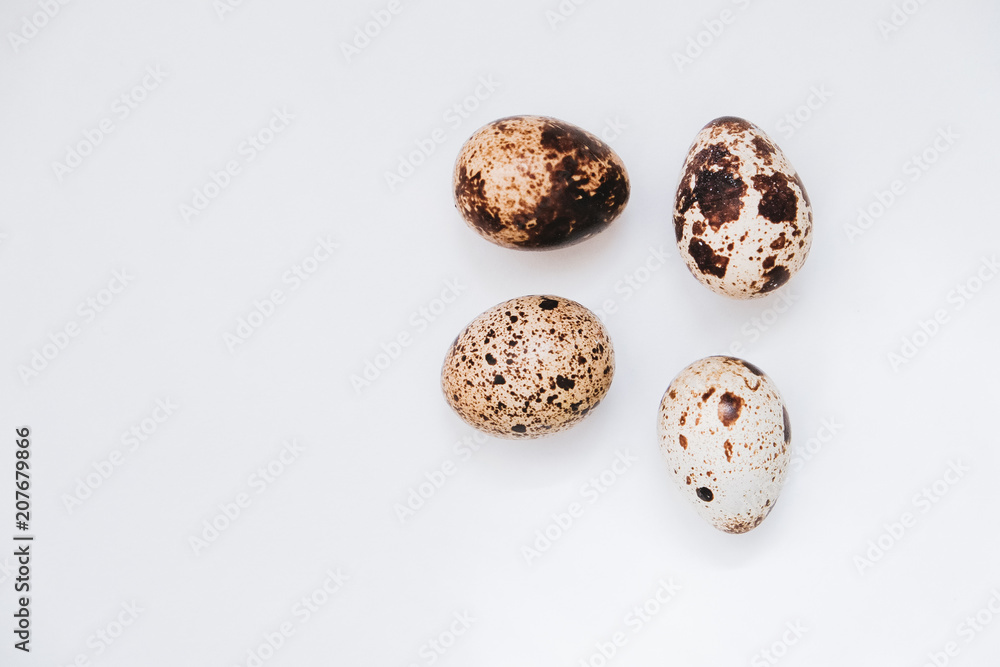 Fresh quail eggs on white background Fresh quail eggs on white background