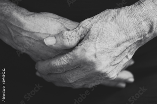 Old woman crossing hands