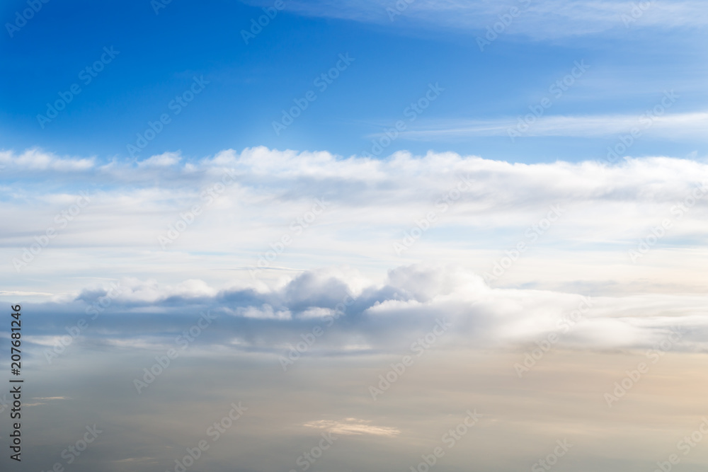 Skyline View above the Clouds from Airplane