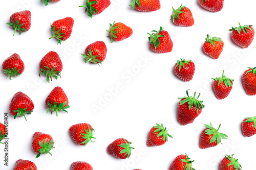Composition with ripe red strawberries on light background