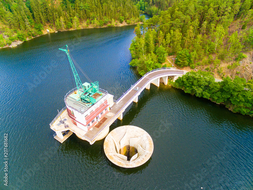 The Hracholusky dam with water power plant. The water reservoir on the river Mze. Source of renewable energy and popular recreational area in Western Bohemia. Czech Republic, Europe. photo