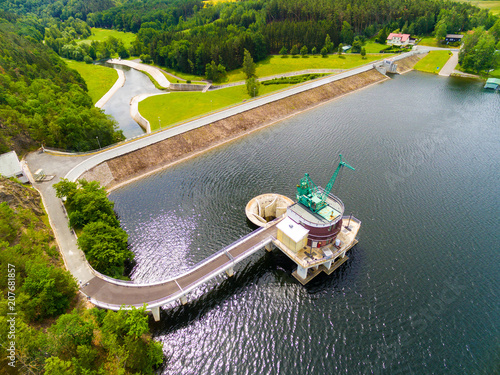 The Hracholusky dam with water power plant. The water reservoir on the river Mze. Source of renewable energy and popular recreational area in Western Bohemia. Czech Republic, Europe. photo