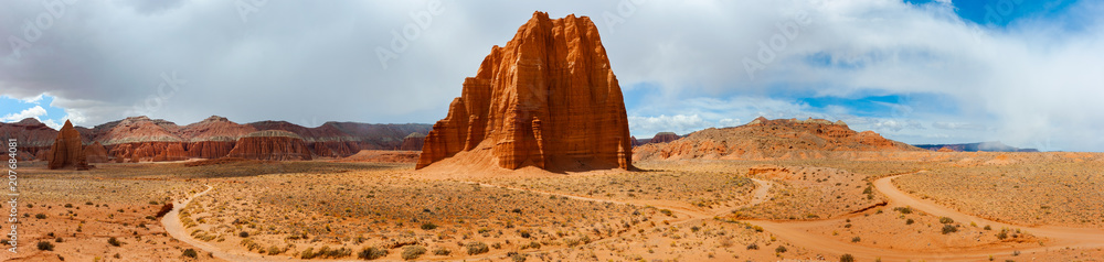 Temple of the Sun and Moon, Capitol Reef National Park, Utah. A remote, stark desert characterized by amazingly beautiful sandstone monoliths that some say resemble cathedrals.