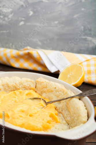 Preparation of lemon cake with lemon curd with copy space