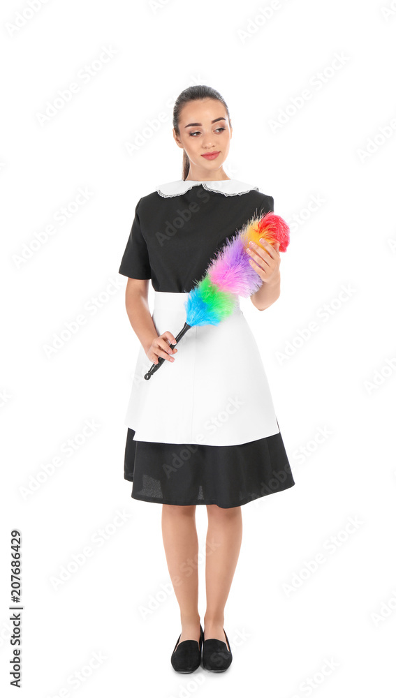 Young chambermaid with dusting brush on white background Young chambermaid with dusting brush on white background