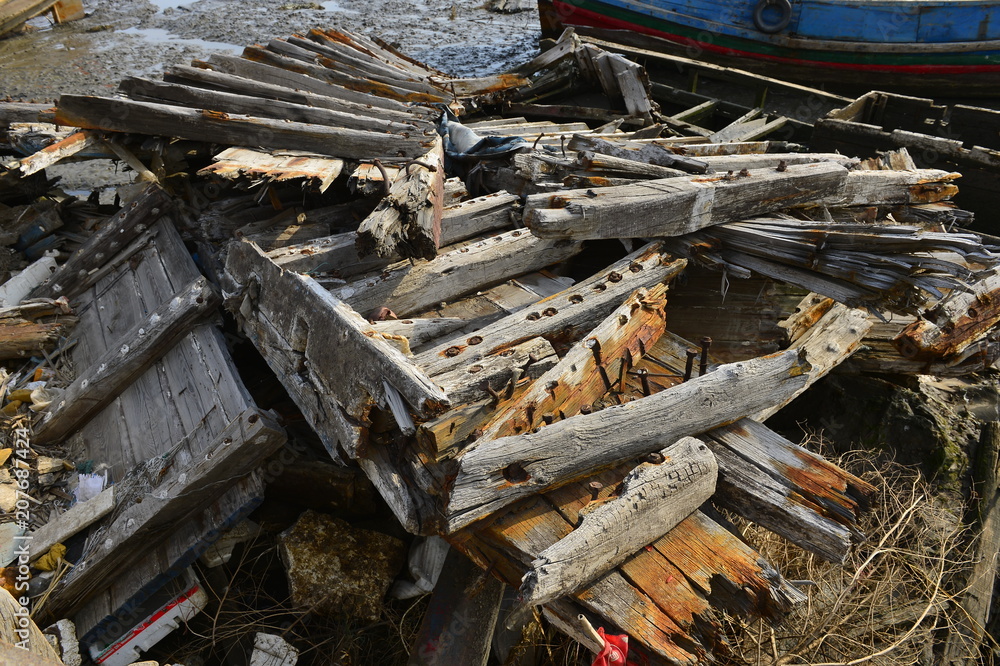 Broken wooden boats in the river